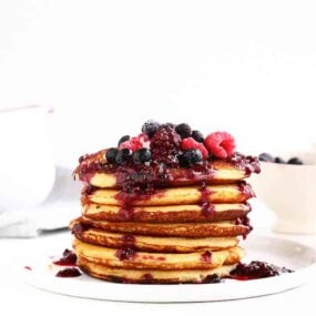 Gluten Free Pancakes with Berry Coulis – The most delicious, guilt free breakfast that is easy to make and only takes a few minutes to whip up.