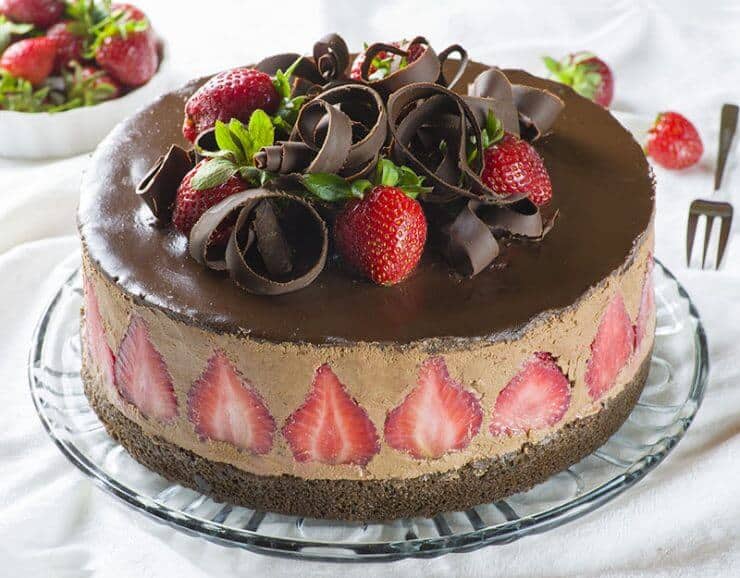 strawberry chocolate cake on a glass plate 