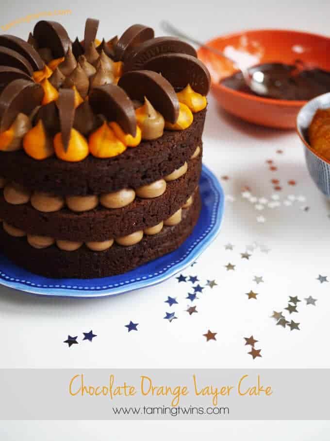 chocolate orange layer cake on blue plate 