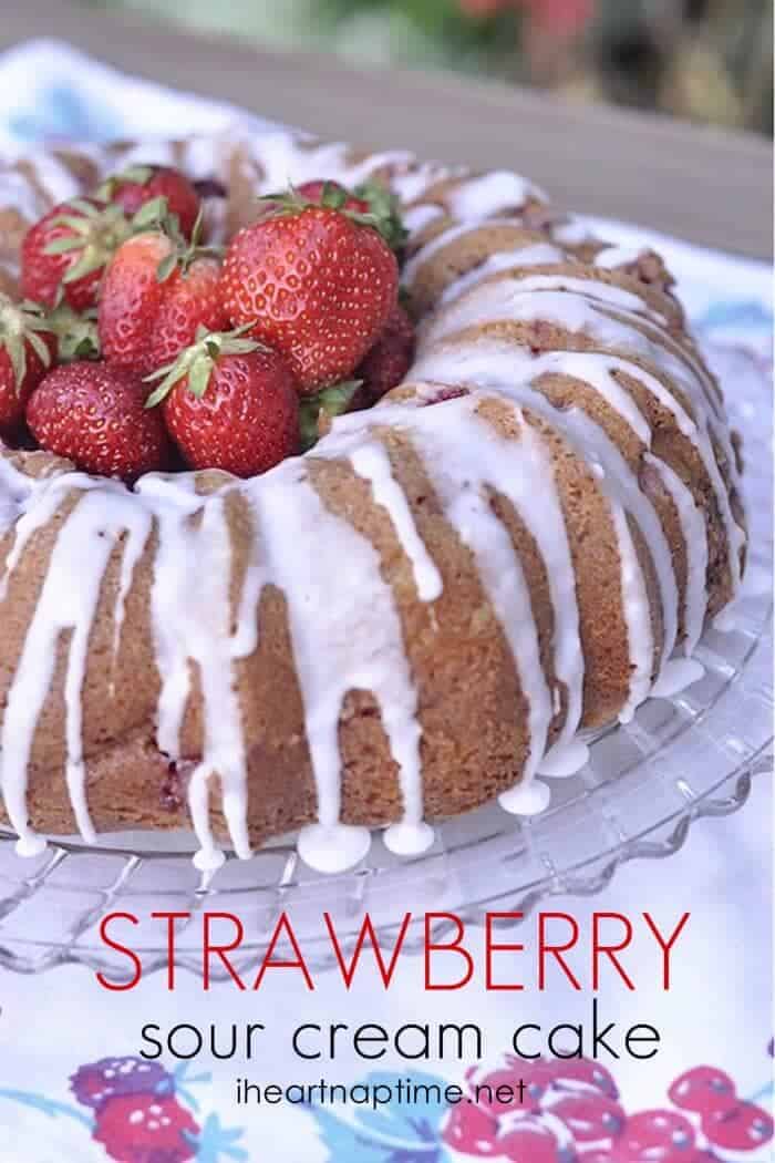 strawberry sour cream cake on a glass dish 