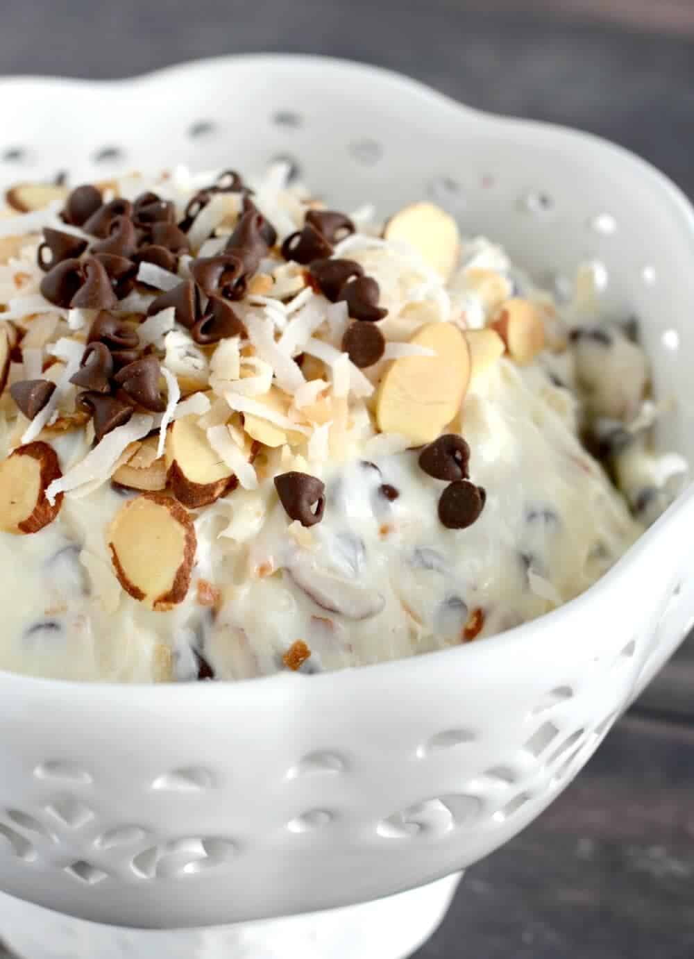 close up of a bowl of almond joy dip 