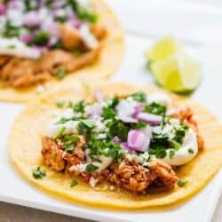 Slow Cooker Chicken Tinga Tacos - 5 minutes to prep and it tastes like it came from a Mexican restaurant!