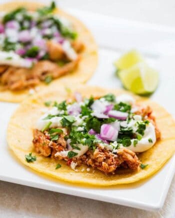 Slow Cooker Chicken Tinga Tacos - 5 minutes to prep and it tastes like it came from a Mexican restaurant!