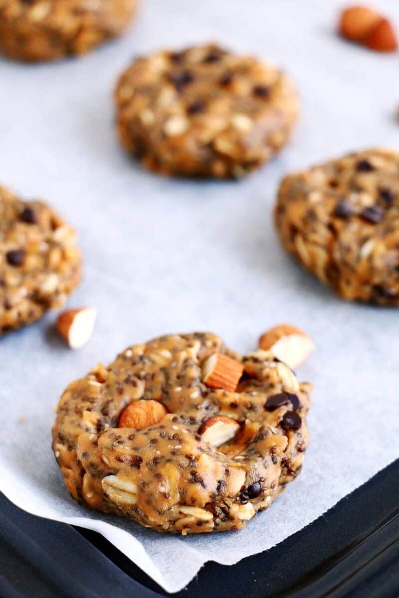These no-bake breakfast cookies are easy to make, healthy, packed with protein and simply delicious. They can be whipped up in less than 5 minutes and stored for up to two weeks. breakfast cookie on baking sheet