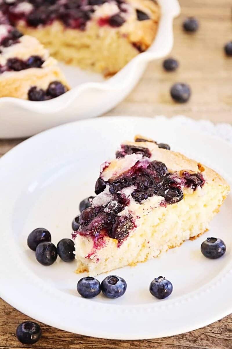 slice of blueberry buttermilk cake on plate 