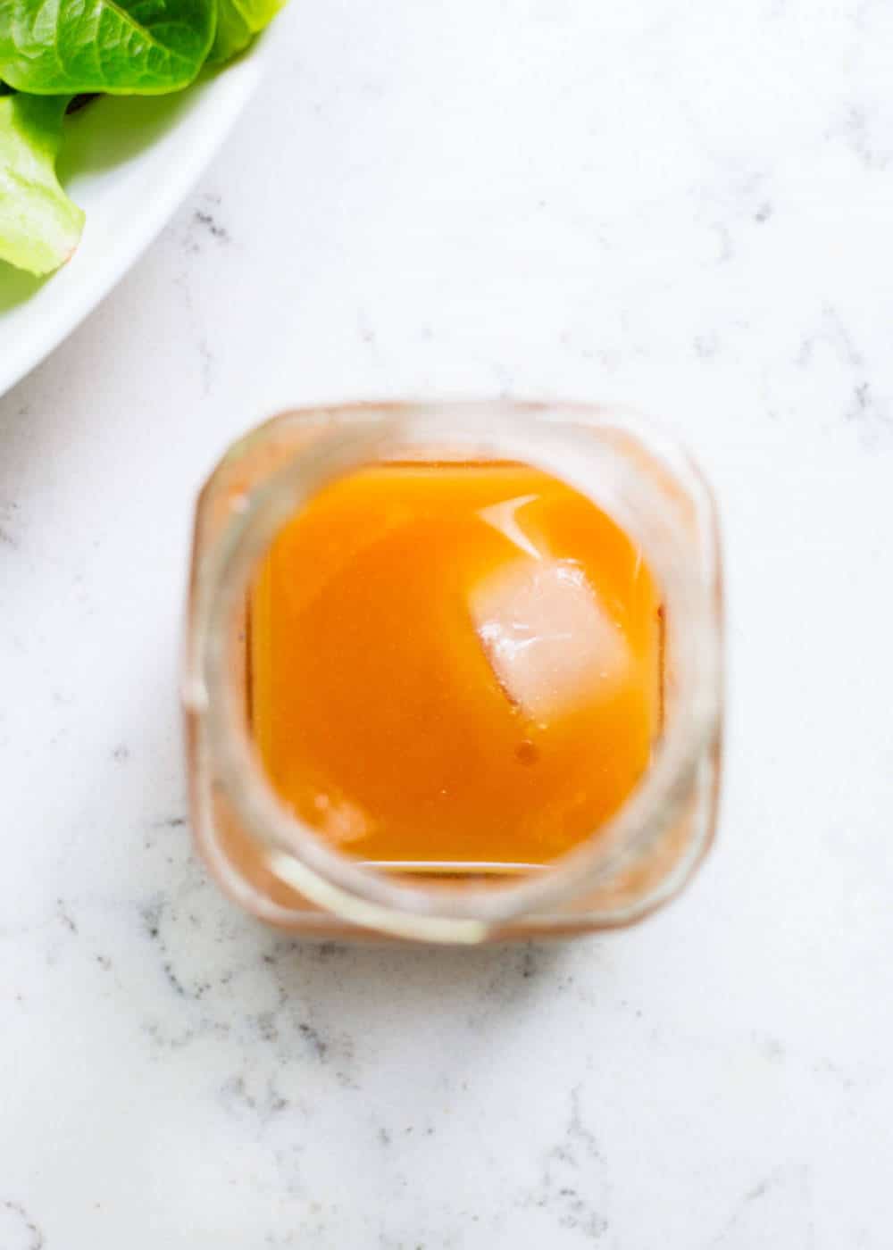 Poppyseed dressing in jar.