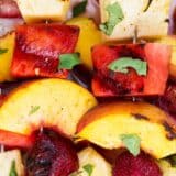 close up of grilled fruit kabobs