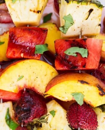 close up of grilled fruit kabobs