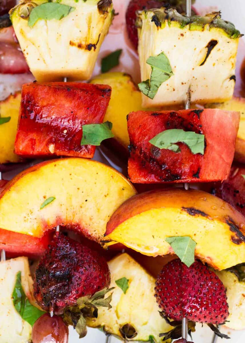 close up of grilled fruit kabobs 