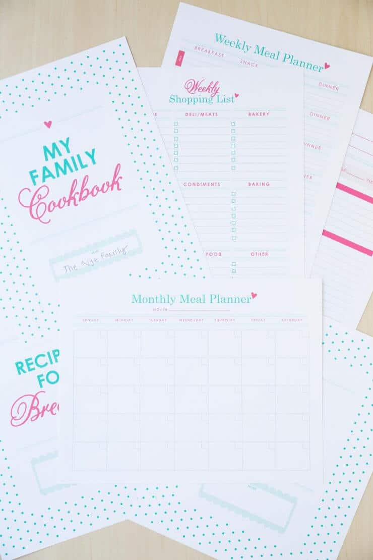 pages of a recipe binder sitting on the counter 