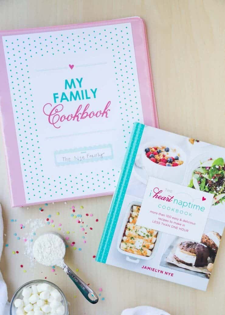 A family recipe binder and The I Heart Naptime Cookbook sitting on the counter 