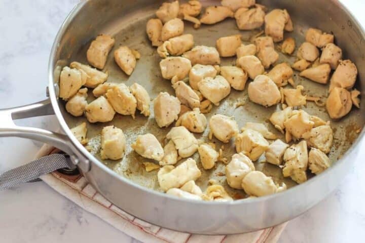 cooking chicken in pan 