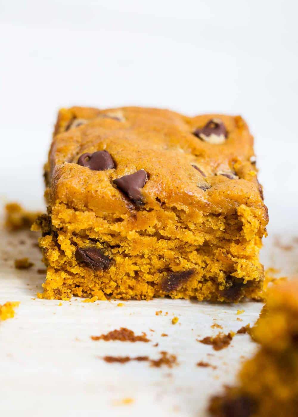 Stack of pumpkin chocolate chip bars.