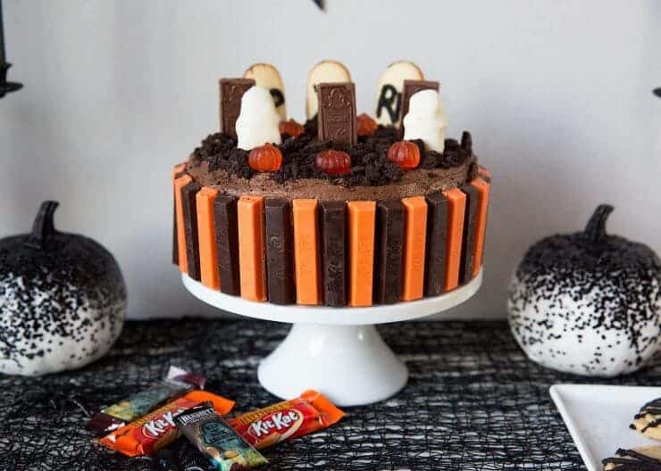 Halloween Graveyard Cake... serve up this spooky chocolate graveyard cake for your next Halloween party! It's super easy and delicious!