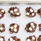 Slow Cooker Rocky Road Candy... super easy to make and only takes 5 ingredients! The best part about this recipe is there is absolutely no cooking or baking required. Perfect for when you need a last minute holiday treat.