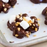 rocky road candy on a baking sheet with wax paper
