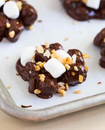 rocky road candy on a baking sheet with wax paper