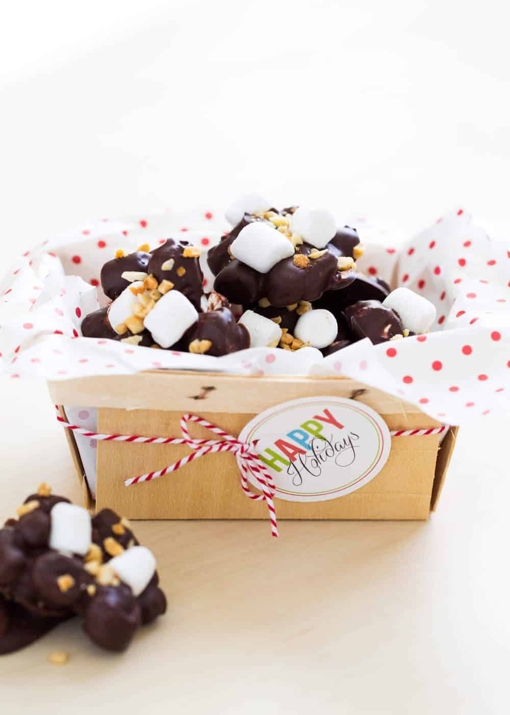 Rocky road candy gift box with christmas tag.