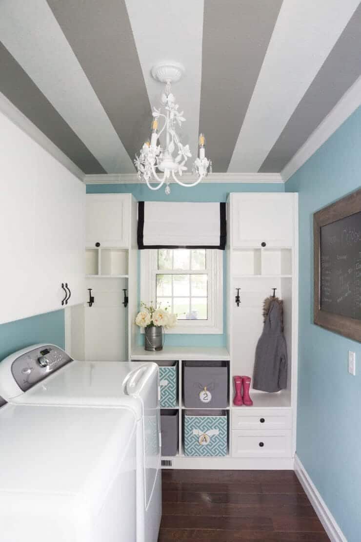 How to Paint a Striped Ceiling ... an unexpected striped ceiling in the laundry room is the perfect pop of surprise in a much-used room that helps making laundry more fun!