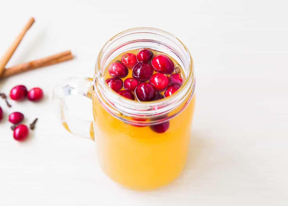 Wassail drink in glass mug.