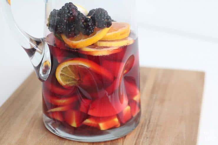 Non-Alcoholic Sangria - A fresh and fruity virgin sangria recipe that makes the most refreshing drink for any event! Not to mention that it looks absolutely beautiful. This will quickly become your favorite non-alcoholic sangria recipe! non-alcoholic sangria