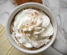 Snickerdoodle Hot Chocolate... a delicious twist on your standard hot chocolate, spiced with cinnamon sugar and perfect for the holiday season!