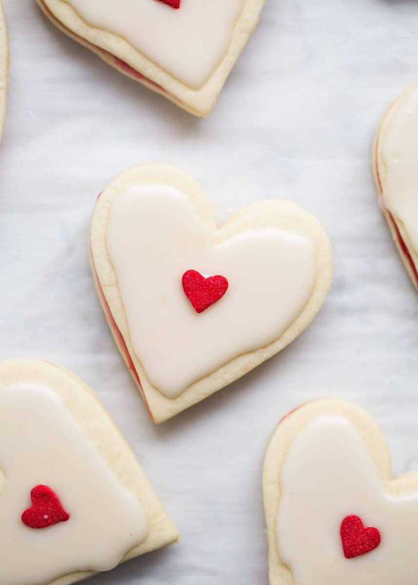 close up of a heart shaped valentine empire cookie