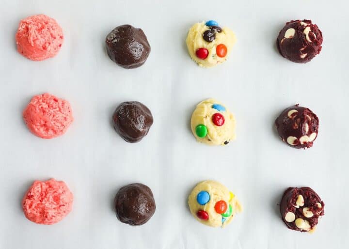These cake mix cookies are such an easy and delicious recipe to make with only 3 ingredients! Customize this recipe with your favorite flavor and mix-in's. cake mix cookie dough balls on baking sheet