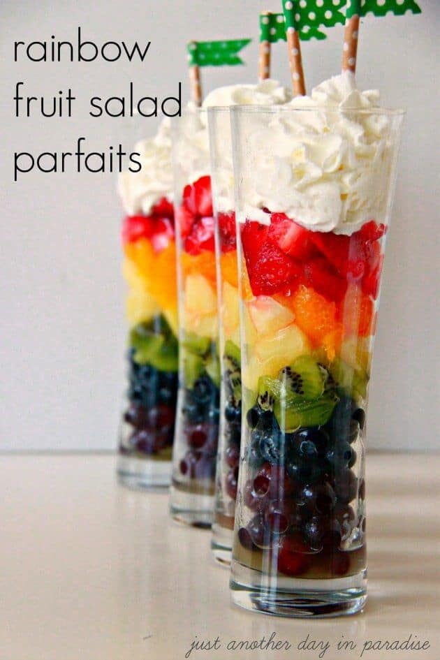 A close up of rainbow fruit salad parfaits 