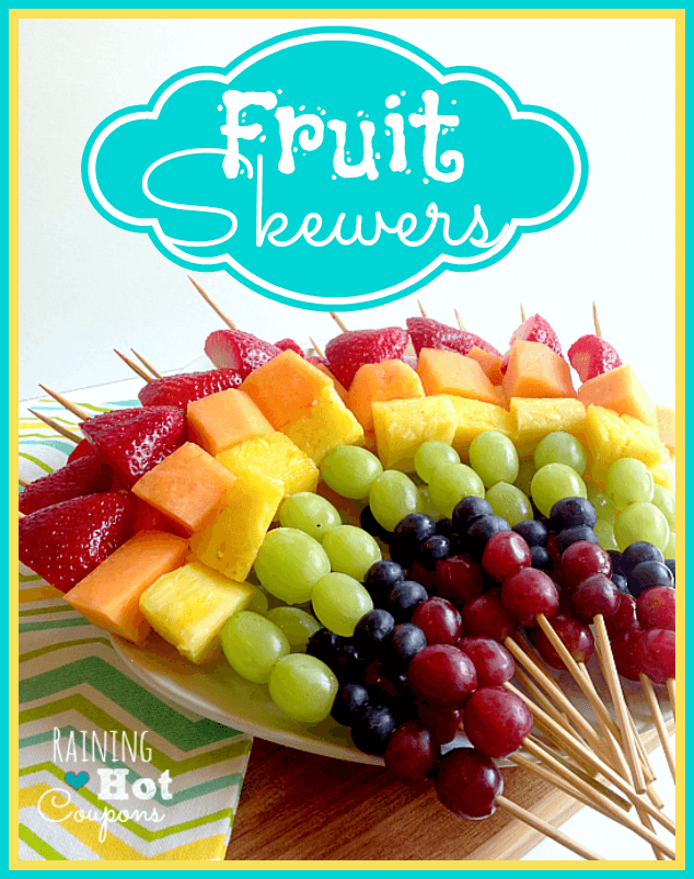 rainbow fruit skewers on a plate 