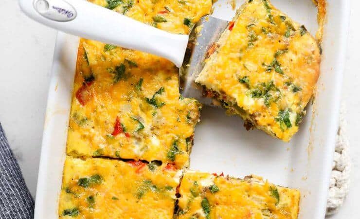 Make Ahead Sausage and Egg Breakfast Casserole ...one of my go-to easy breakfast recipes! This sausage and egg breakfast casserole is one of my families favorites to make for Sunday brunch and holidays.