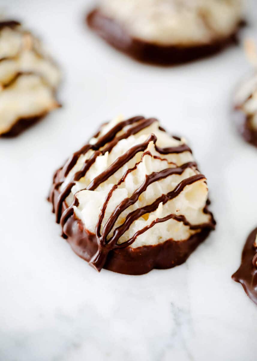 coconut macaroons drizzled in chocolate