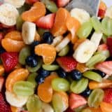 Rainbow Honey Lime Fruit Salad Recipe ...filled with fresh strawberries, oranges, bananas, grapes and blueberries. Topped with a honey lime glaze. This fruit salad is very easy and very tasty!