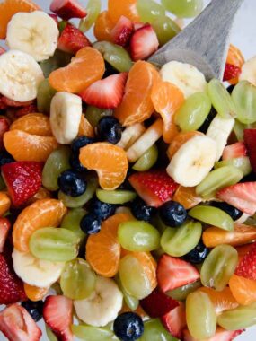 Rainbow Honey Lime Fruit Salad Recipe ...filled with fresh strawberries, oranges, bananas, grapes and blueberries. Topped with a honey lime glaze. This fruit salad is very easy and very tasty!