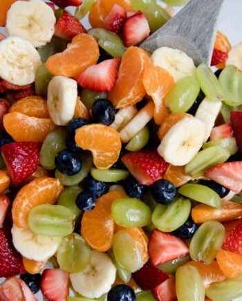 Rainbow Honey Lime Fruit Salad Recipe ...filled with fresh strawberries, oranges, bananas, grapes and blueberries. Topped with a honey lime glaze. This fruit salad is very easy and very tasty!