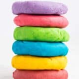 rainbow colored play dough stacked on top of each other