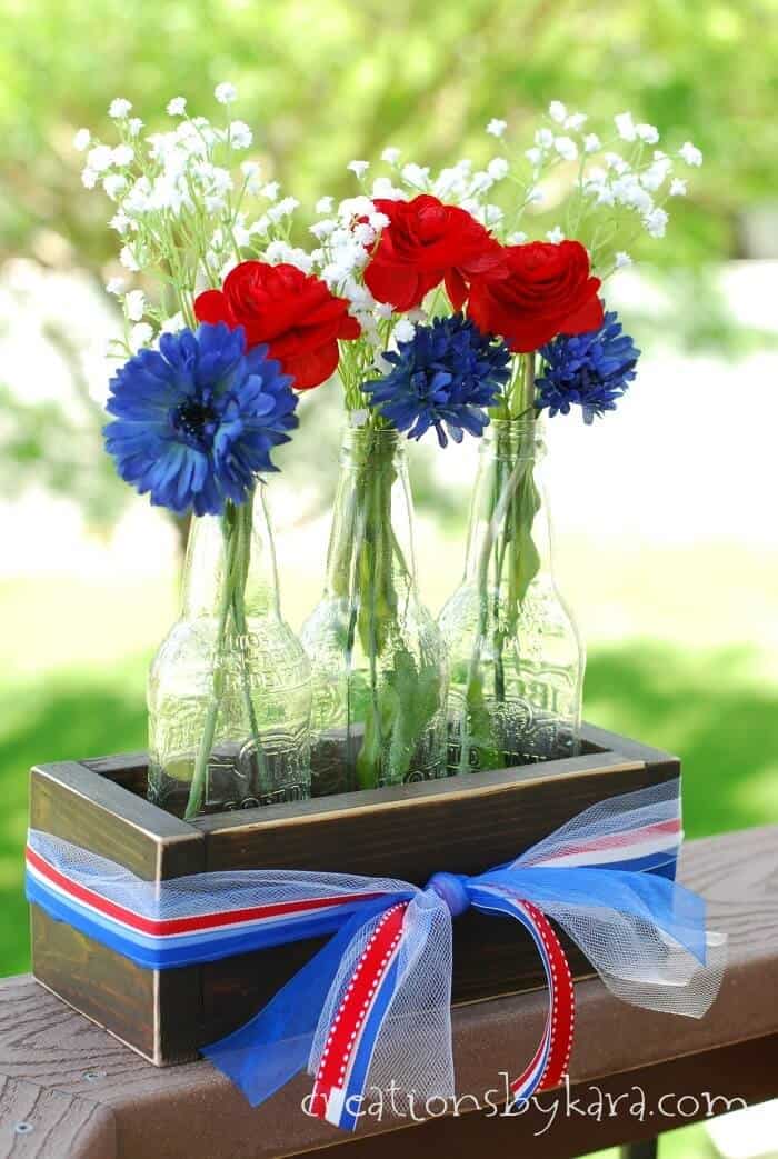 Rustic Crate with Bottle Vases Centerpiece + 50 Festive Memorial Day BBQ Ideas...creative ways to kick-off summer and celebrate our freedom while remembering our fallen heroes!
