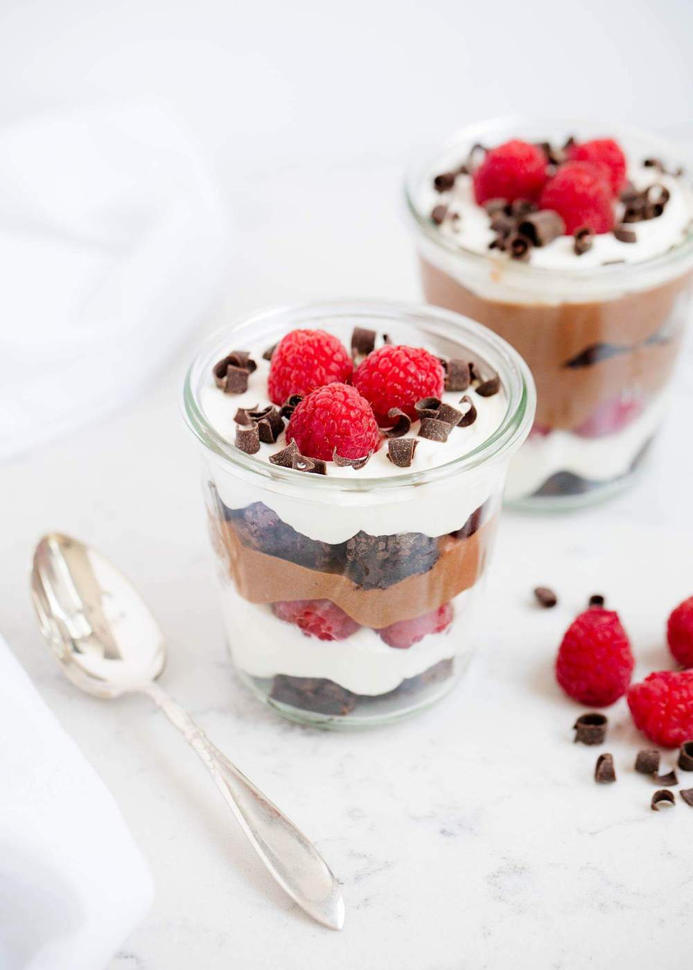 Mini brownie trifle in glass jar.