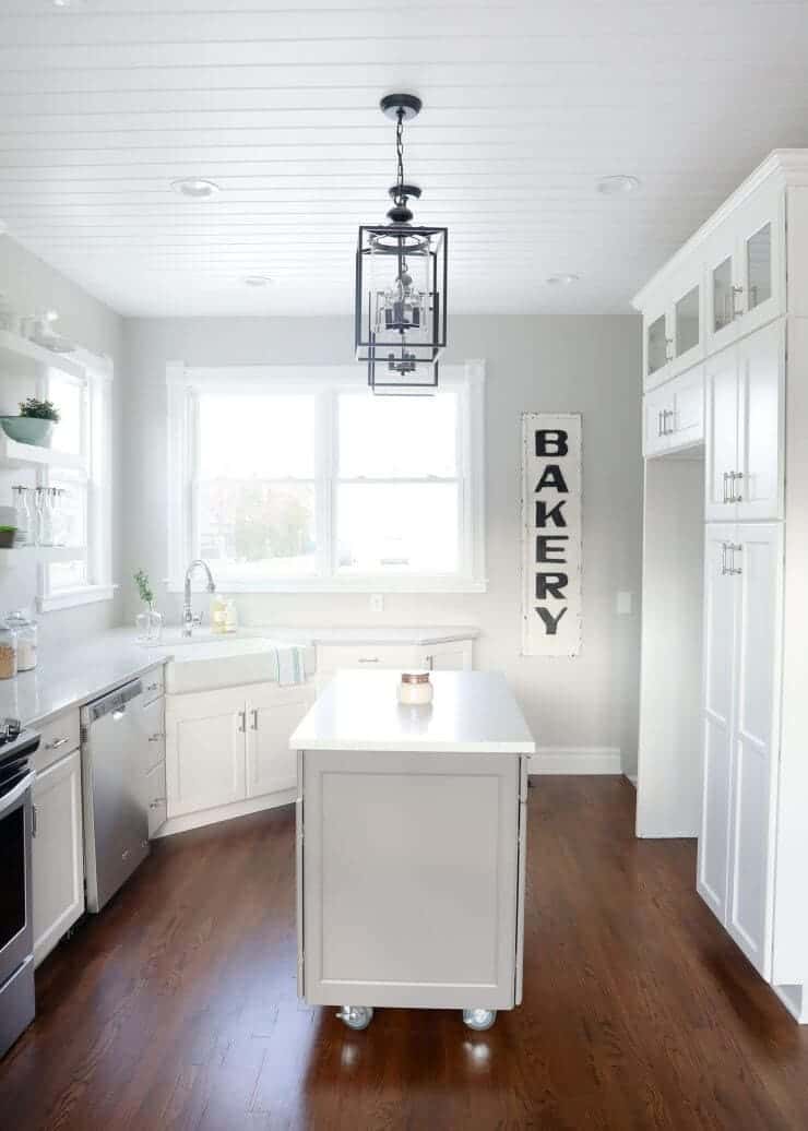 A kitchen with a wood floor