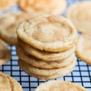 stack of snickerdoodles on a cooling rack