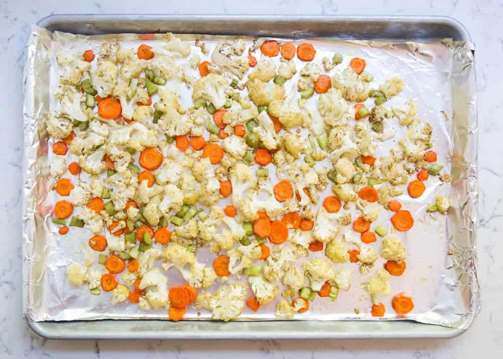A sheet pan filled with roasted vegetables. 