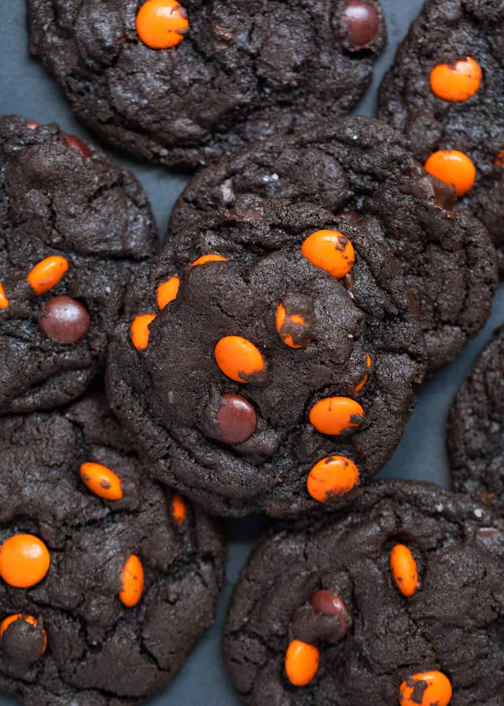 Chocolate cookies with orange chocolate candies.