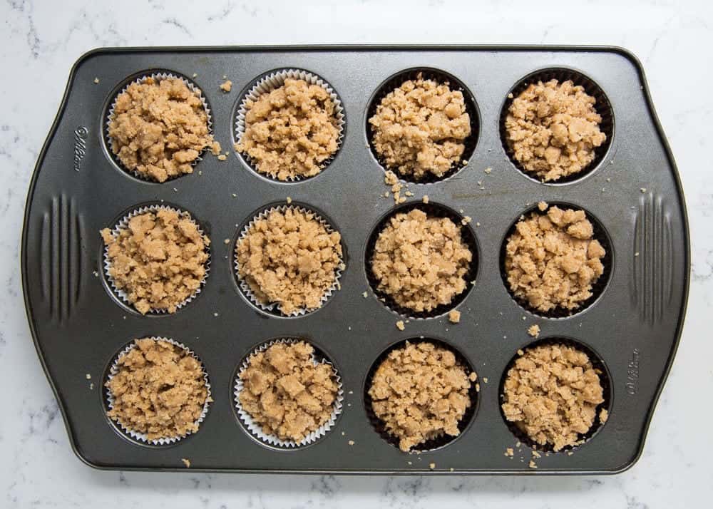 Pumpkin streusel muffins in pan.