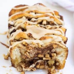 loaf of apple pull apart bread drizzled with caramel icing
