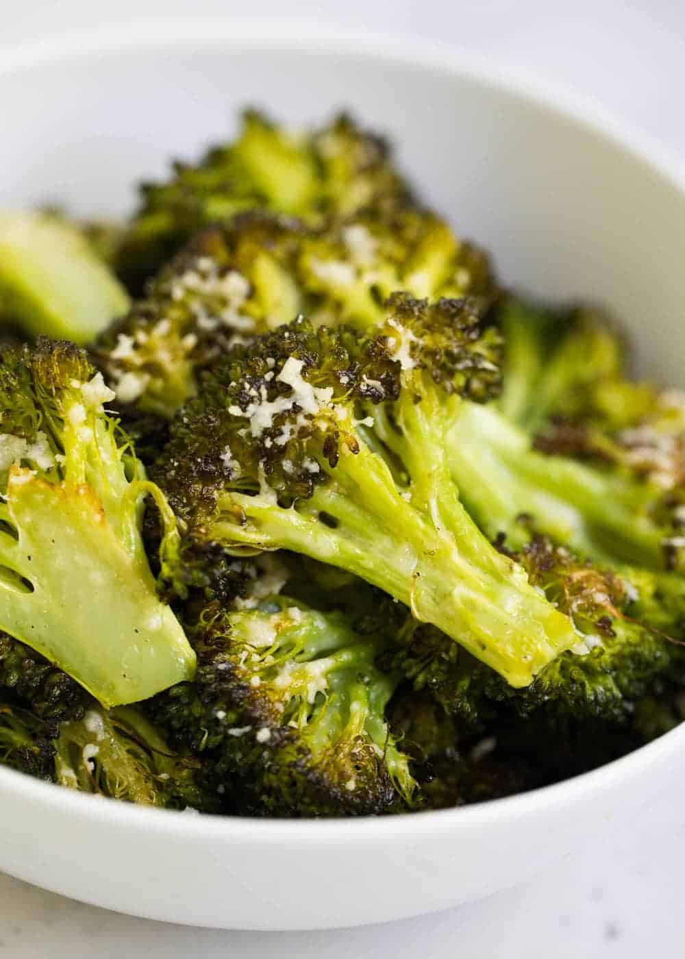 Bowl of parmesan roasted broccoli.
