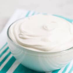 homemade whipped cream in a glass bowl