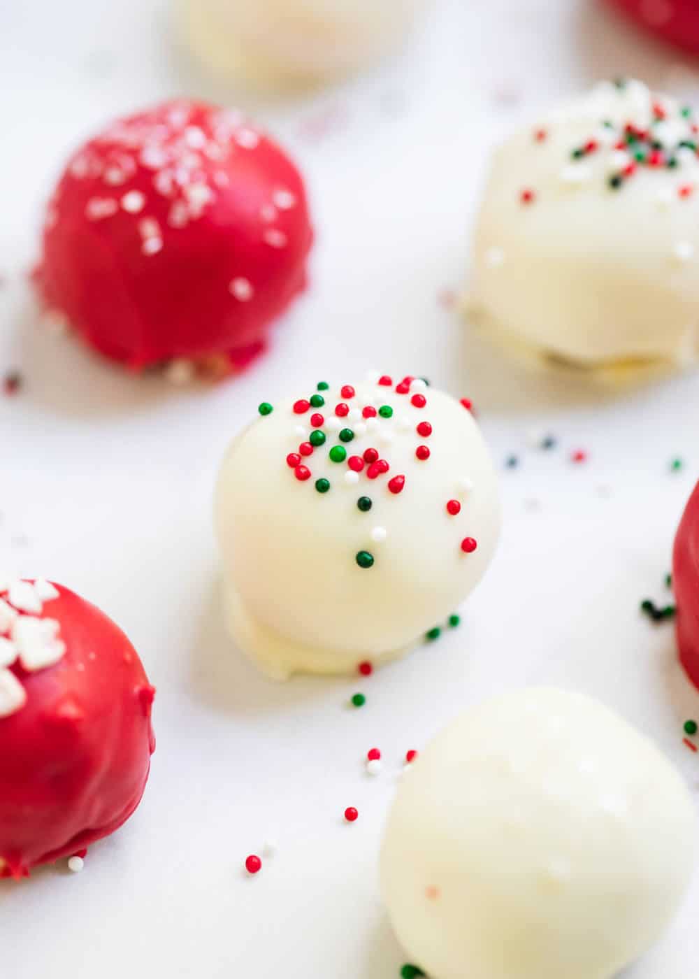 A close up of Christmas sugar cookie truffles.