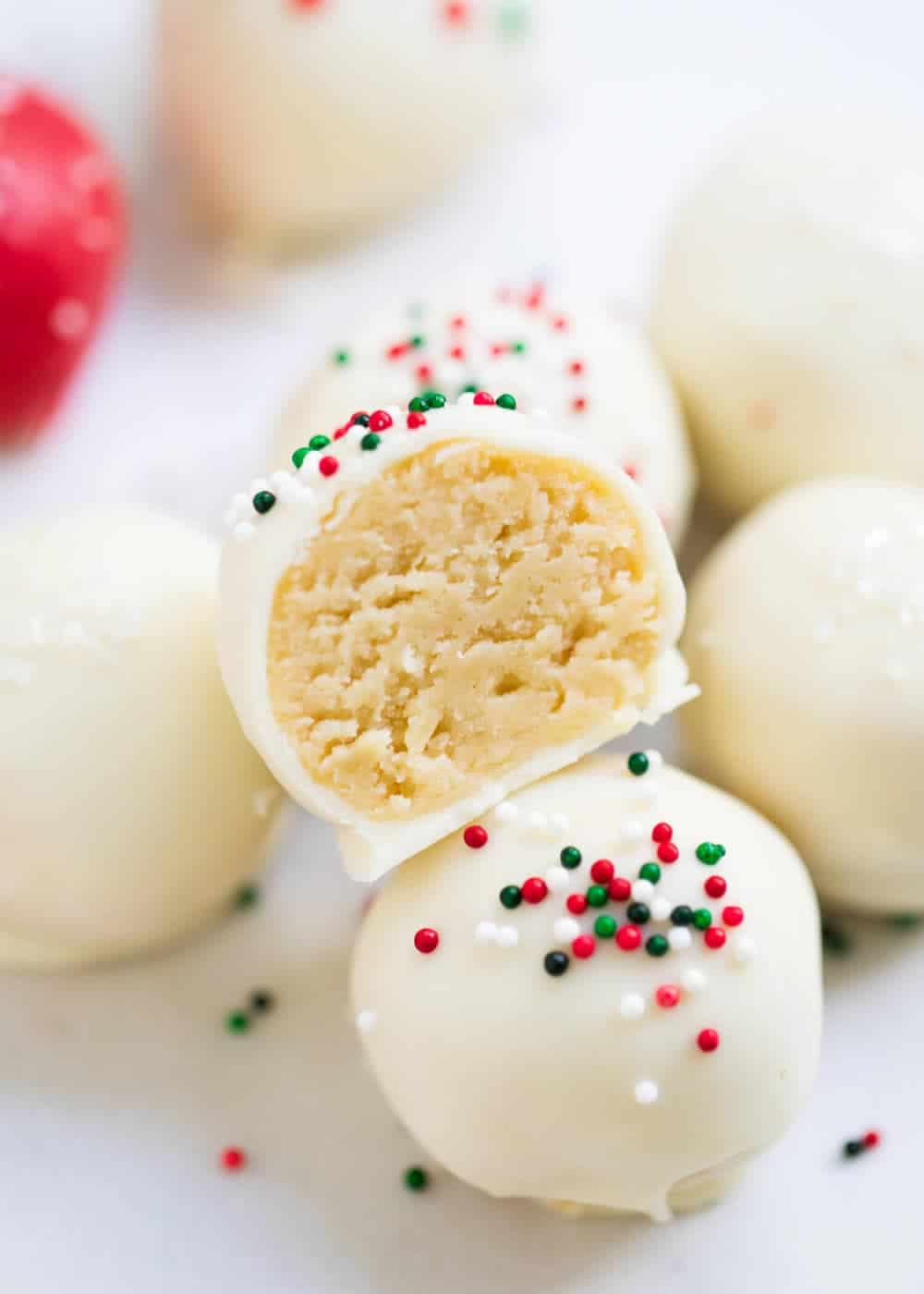 Half eaten Christmas sugar cookie truffle.