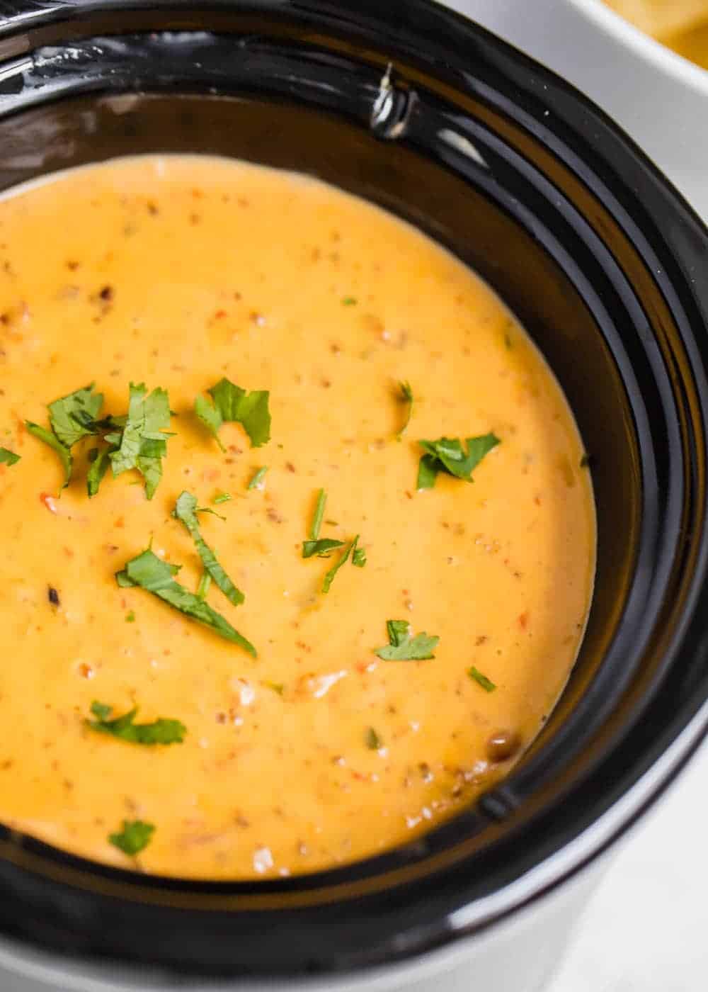 Chorizo cheese dip in mini crock pot. 