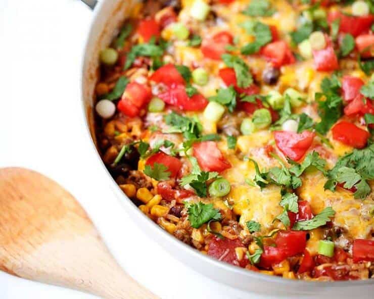 One pot burrito bowls recipe- easy and delicious one pot meal! This dinner recipe is made in one pot in 30 minutes ...making clean up a breeze. Perfect for busy week nights! burrito bowls recipe